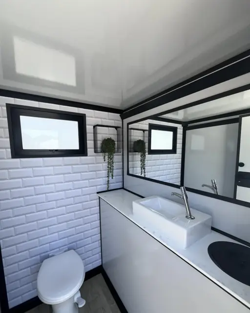 Tiled restroom trailer stall